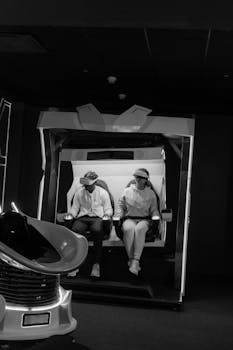 Two people enjoying an immersive virtual reality experience with VR headsets.